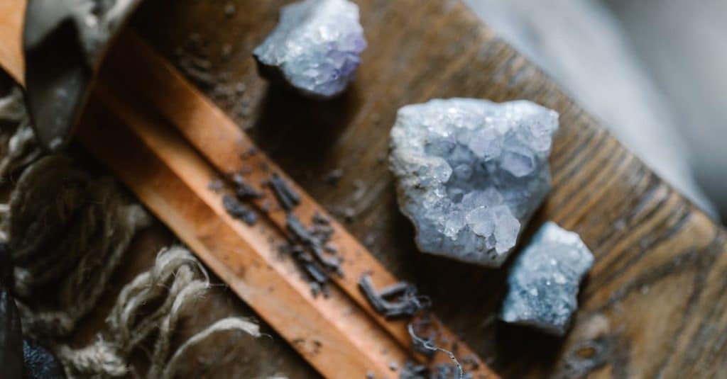 close-up-photo-of-crystals-on-wooden-board